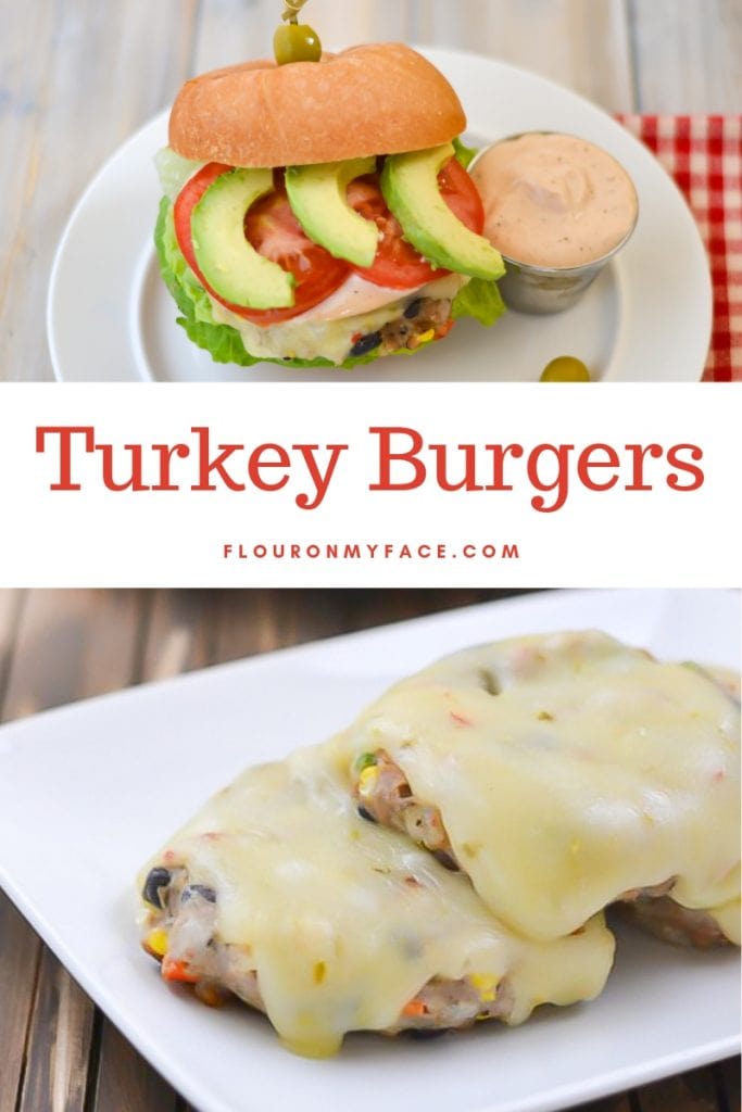 Grilled turkey burgers with melted cheese on a platter.
