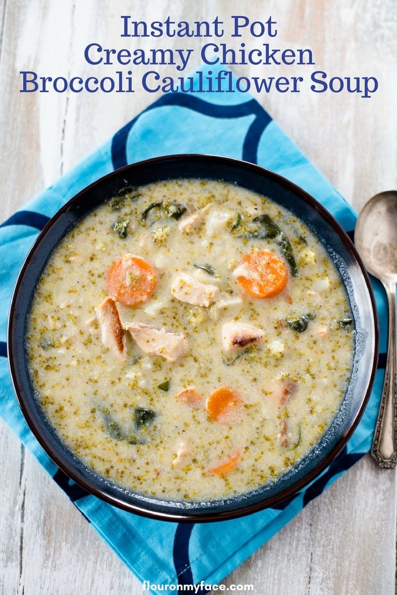 overhead photo of a bowl filled with Instant Pot Creamy Chicken Broccoli Cauliflower soup