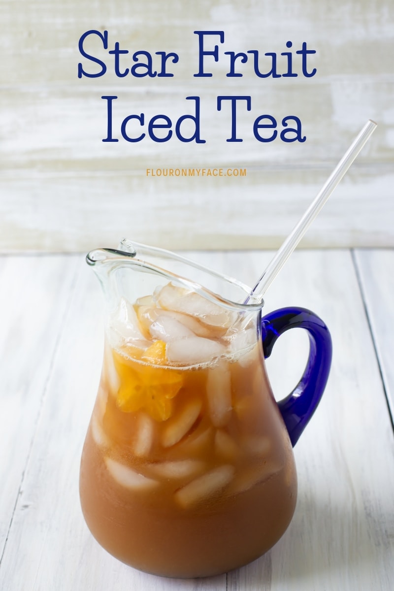 a glass pitcher full of Star Fruit Iced Tea