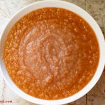 An overhead photo of a large white bowl filled with freshly made Instant Pot Applesauce