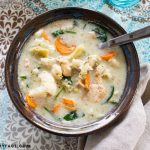 Overhead image of a bowl filled with Instant Pot Creamy Chicken Vegetable Soup Recipe
