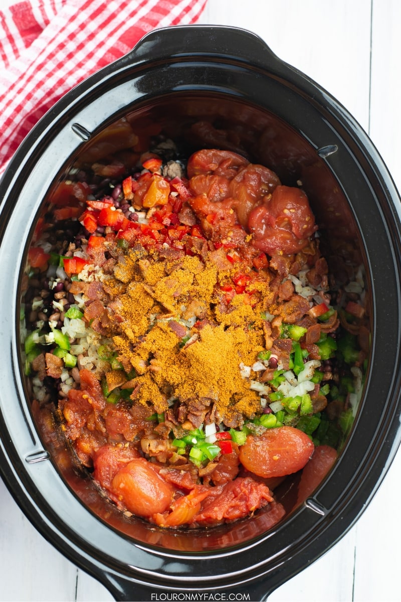 Crock Pot filled with the ingredients to make Cowboy Bean Soup