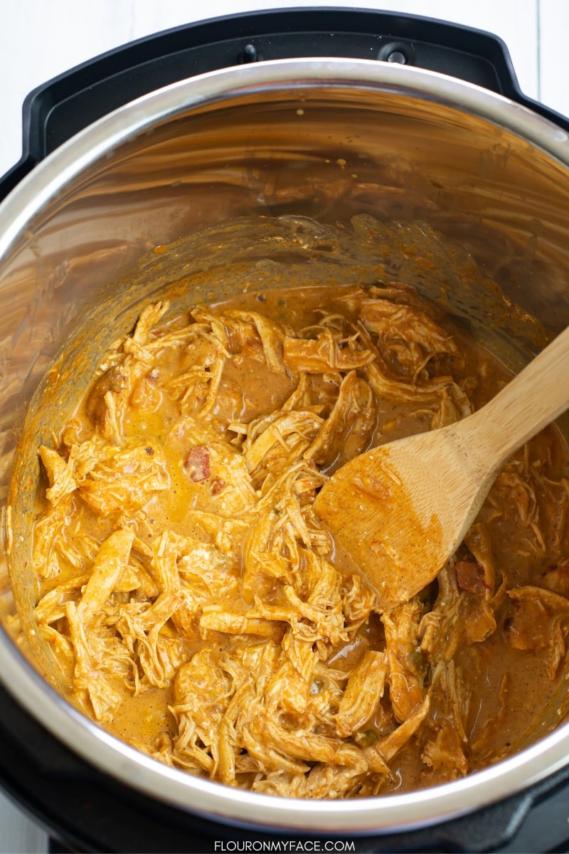 Image of the inside of the Instant Pot filled with Creamy Chicken Taco Filling recipe