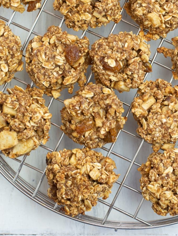 overhead closeup photo of Apple Cinnamon Breakfast Cookies as the cool on a cooling rack
