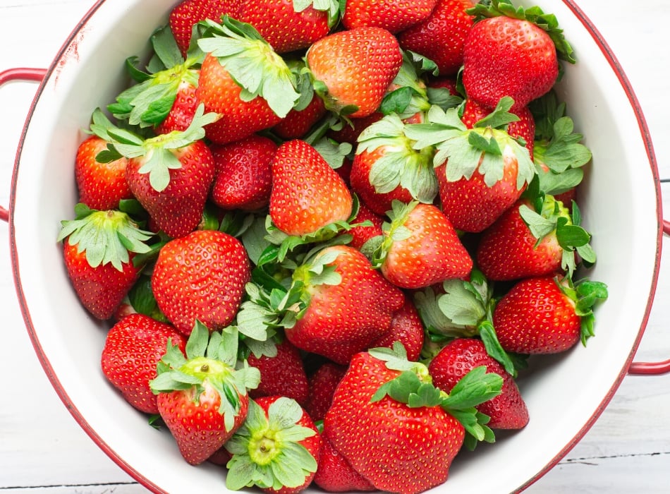 Fresh Florida Strawberries in a white metal colander