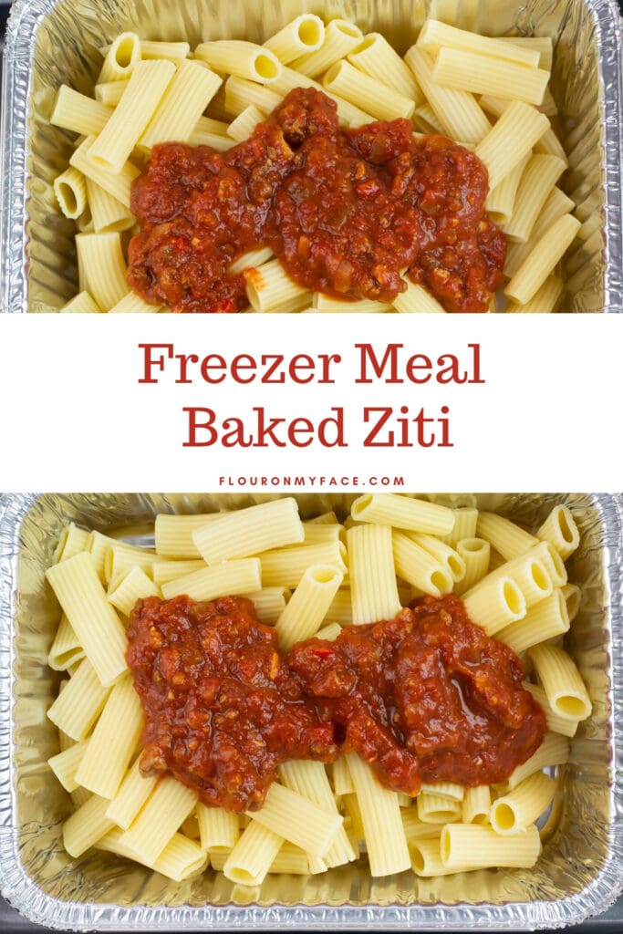 two aluminum trays filled with Ziti noodles with meat sauce