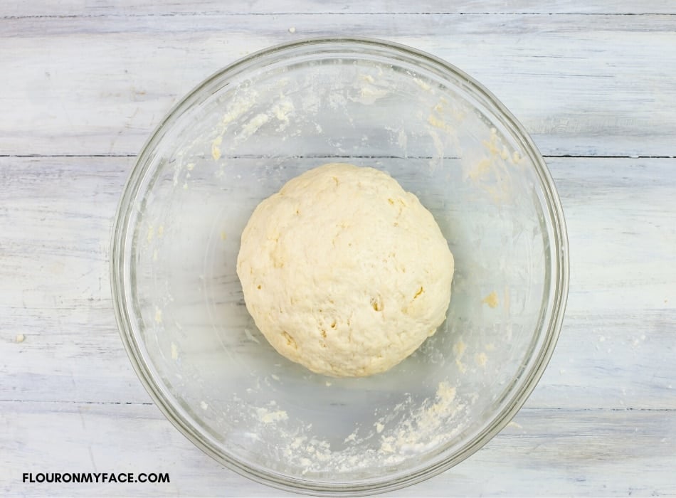 Soda bread dough in a glass bowl.