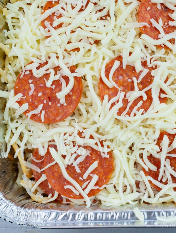 Pepperoni Spaghetti in an aluminum pan before it is baked