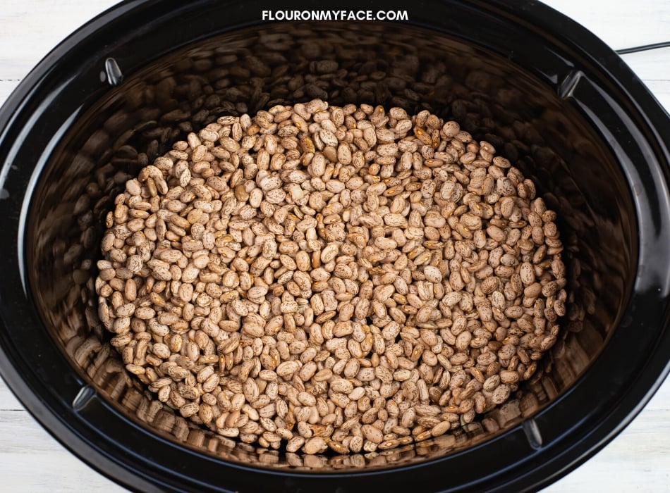 dried pinto beans in a slow cooker