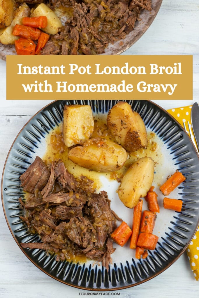 a dinner plate with a serving of Instant Pot London Broil, potatoes, tender carrots and homemade gravy.