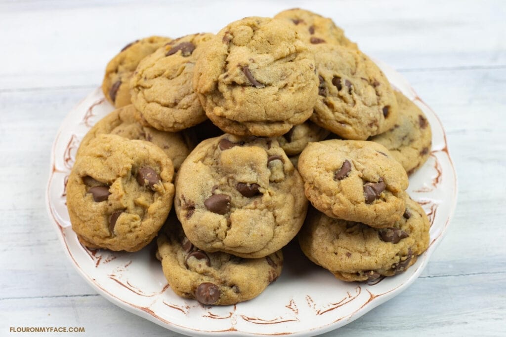a plate of freshly baked chocolate chip cookies