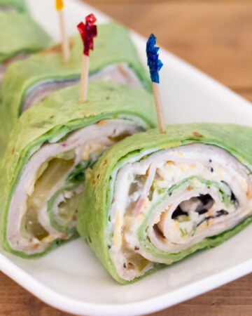 close up photo of Cucumber Ranch Turkey Wraps cut into Pinwheel shaped appetizers
