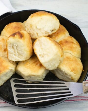 Sourdough Pinch Biscuits in a cast iron skillet fresh from the oven