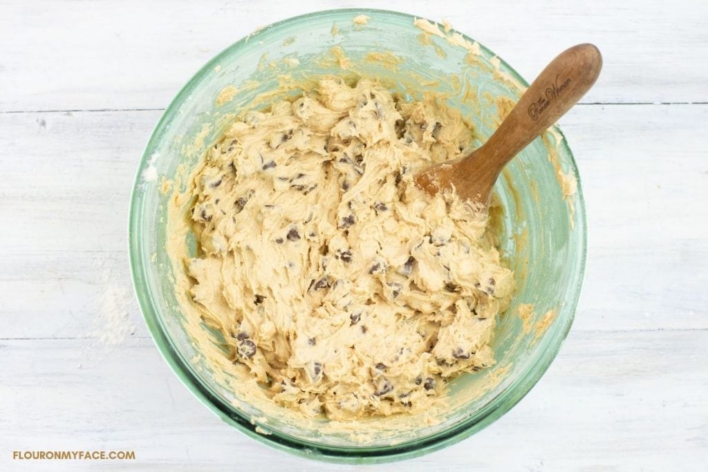 Cookie dough batter in a large glass bowl.