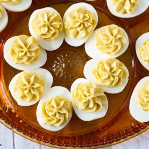 Serving deviled eggs on a glass deviled egg platter