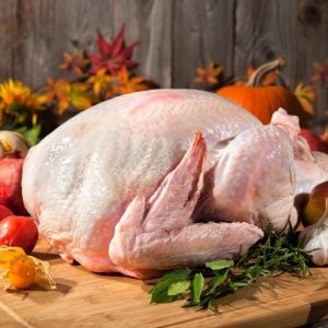 uncooked turkey on a cutting board