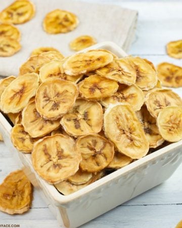 a small bowl filled with dehydrated banana chips.