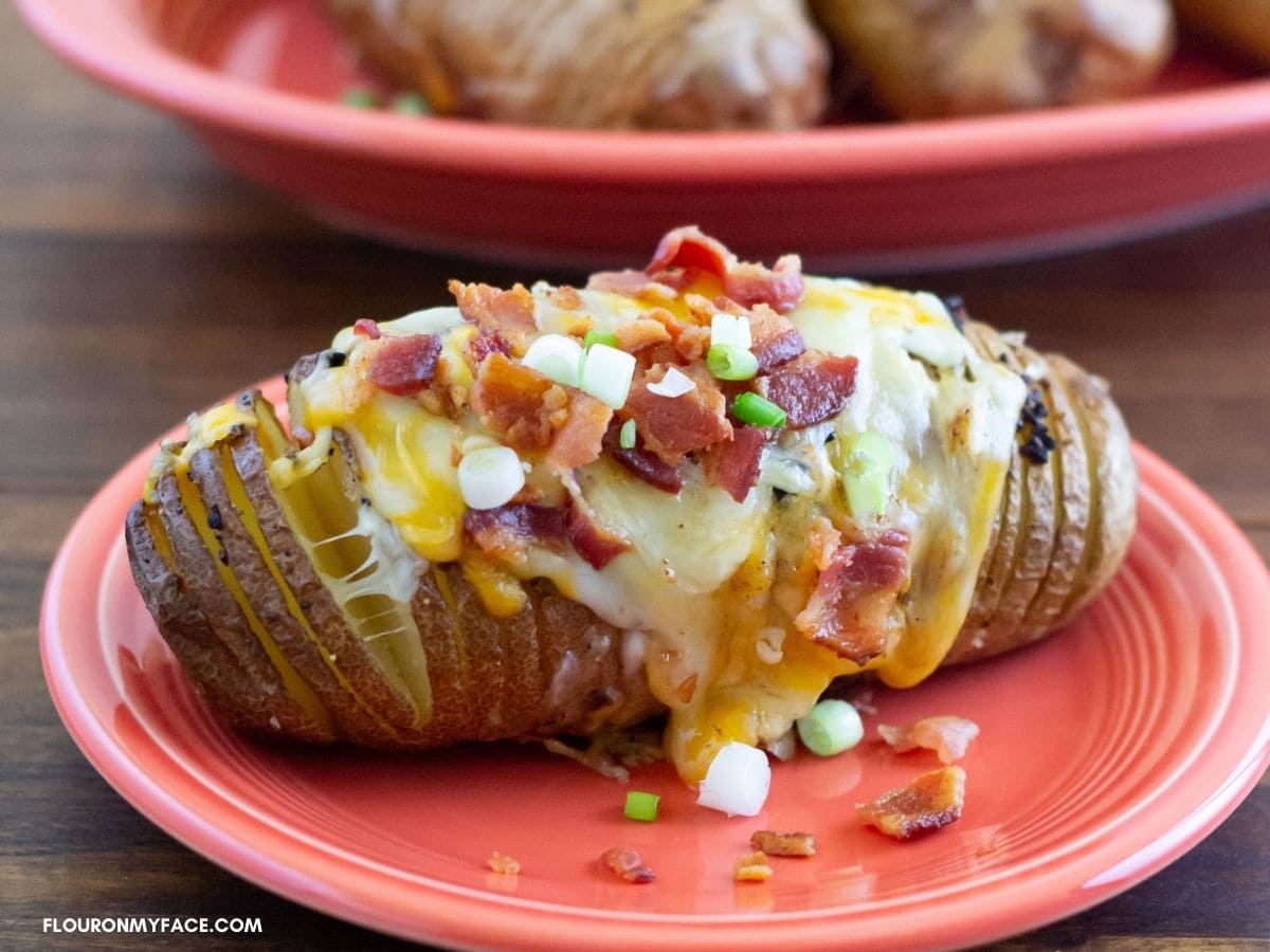 Baked Hasselback Potato with toppings.