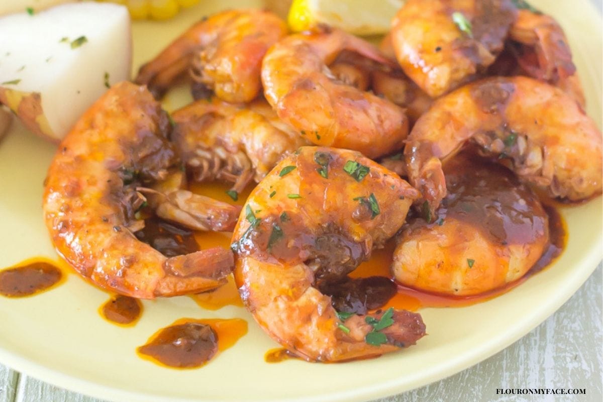 Barbecue Shrimp on a yellow plate.
