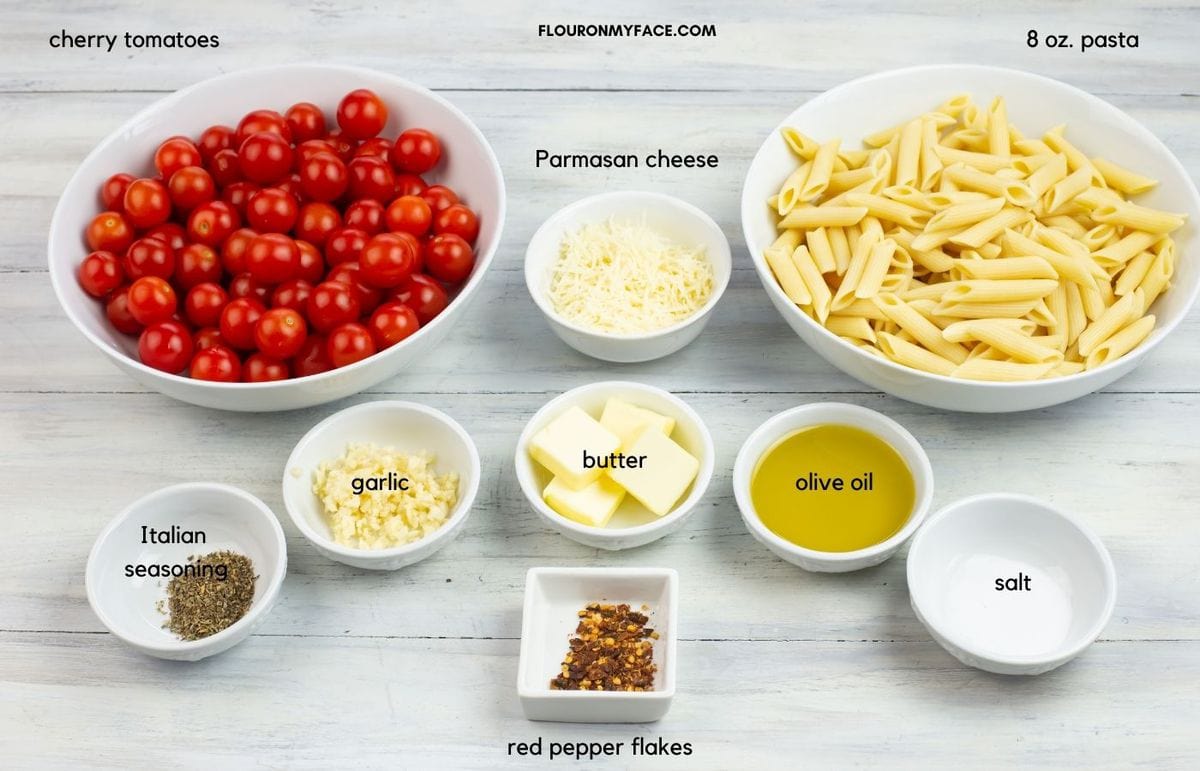 tomato pasta sauce ingredients in individual bowls.