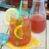 Peach Iced Tea in a mason jar with a straw.