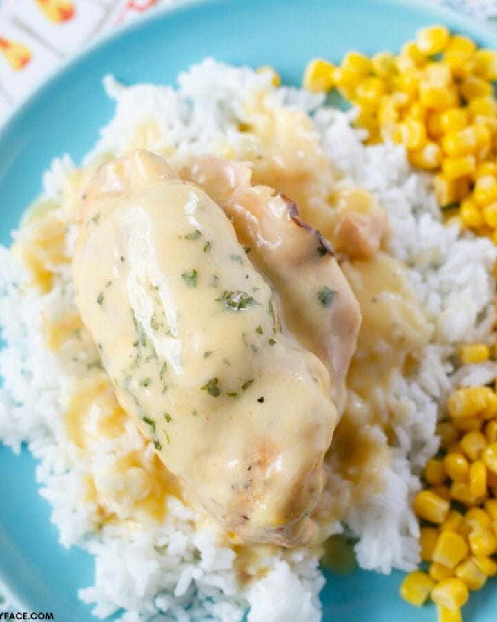 Chicken Cordon Bleu served on rice with corn.