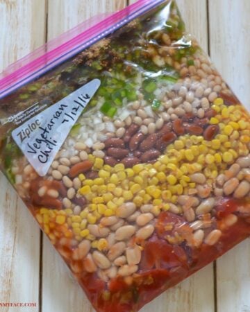 Vegetarian chili ingredients layered in a freezer bag.
