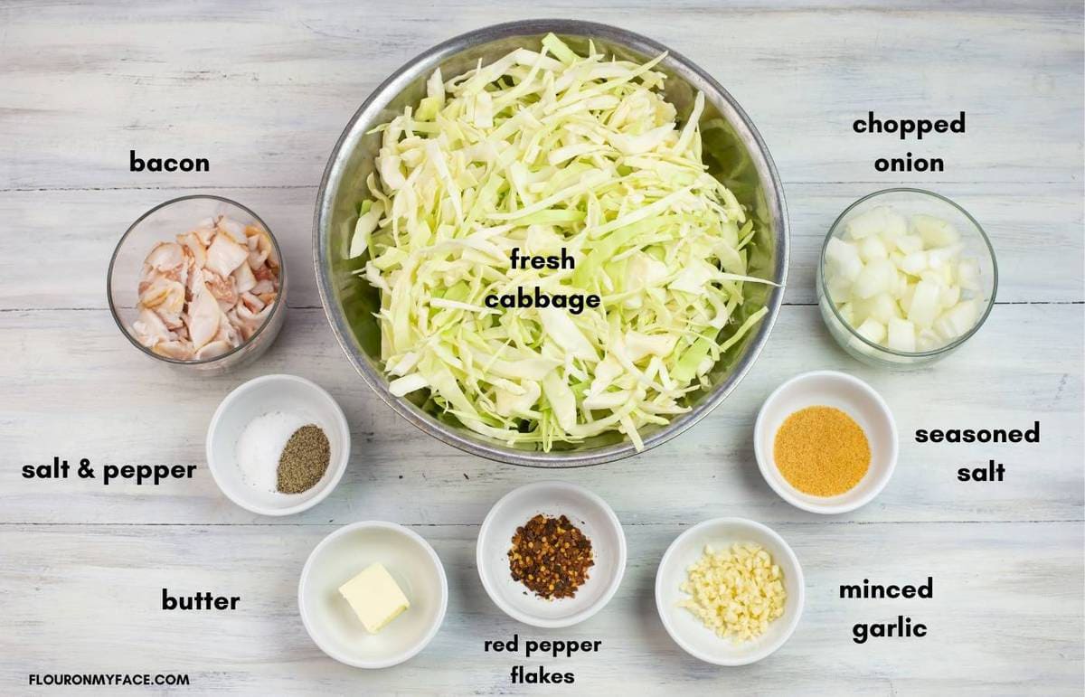 Ingredients to make fried cabbage with bacon in individual bowls.