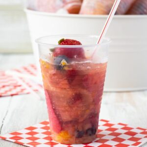 Frozen fruit cups on a napkin.