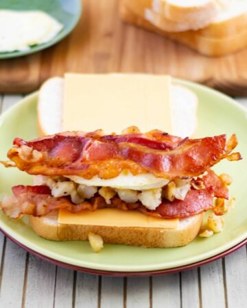 Grilled Cheese Breakfast Sandwich on a plate before grilling.