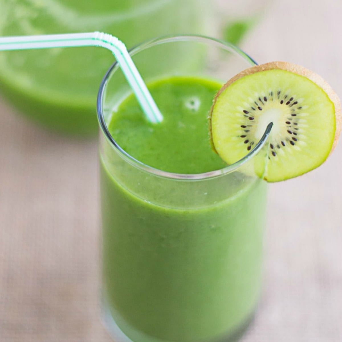 Kiwi Cucumber Smoothie in a tall glass.