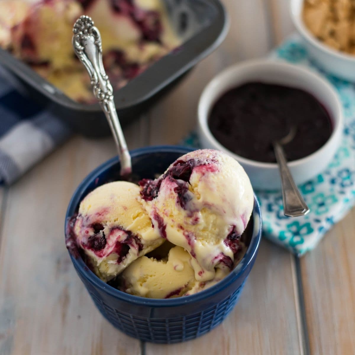 Blueberry Cheesecake Ice Cream in a blue dessert bowl.