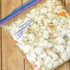 Freezer bag filled with soup ingredients.