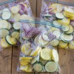 Sliced squash in freezer bags.