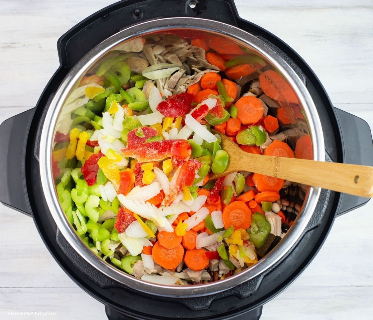 Overhead image of soup vegetables added to the Instant Pot.