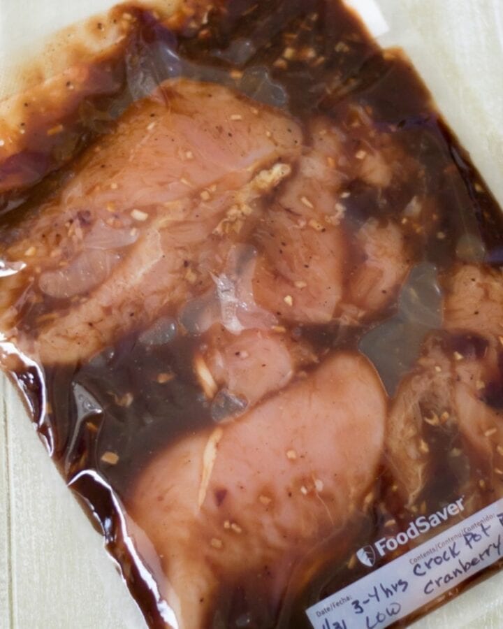 BBQ Cranberry Chicken packed into freezer bags for an east freezer meal.
