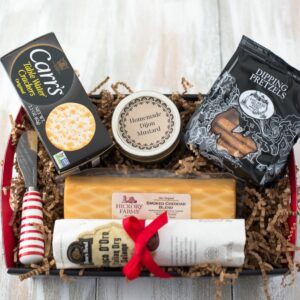 Example of how to fill and make a cheese and sausage gift basket.