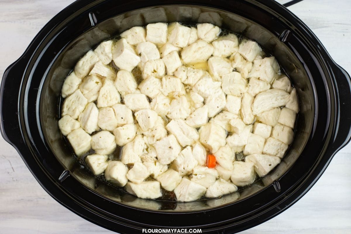 Chicken and dumplings made with canned biscuits that are floating in chicken broth.