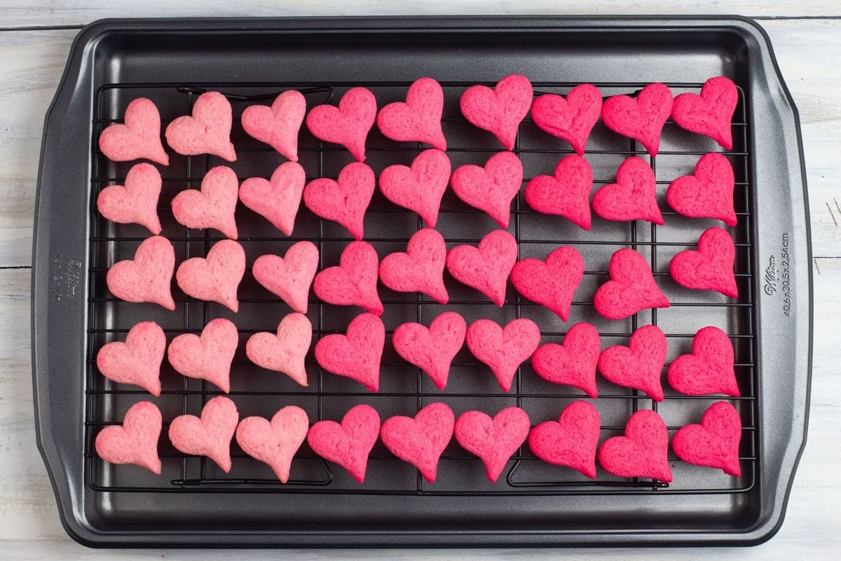 Pink Ombre Cookies on a wire cooling rack.