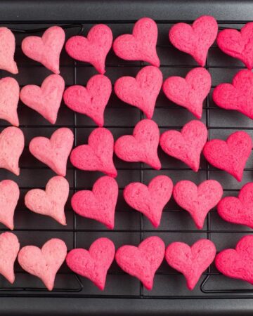 Closeup image of pink ombre heart shaped cookies for Valentines Day.