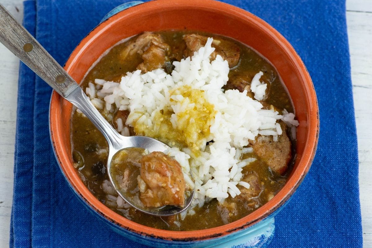 Mexican pork stew with rice in a bowl.