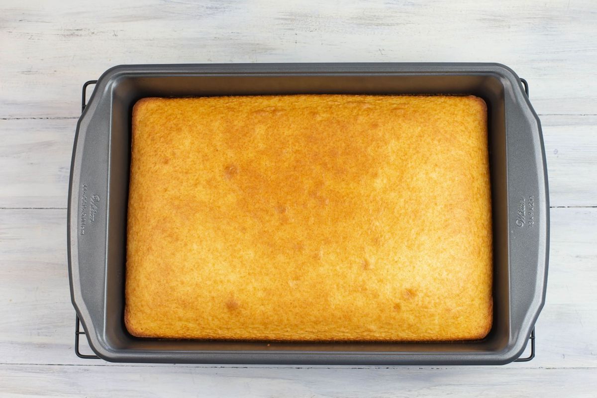 9 x 13 pan with a golden brown baked vanilla cake.