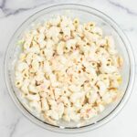 A large bowl filled with Sour Cream Cheddar Pasta Salad.