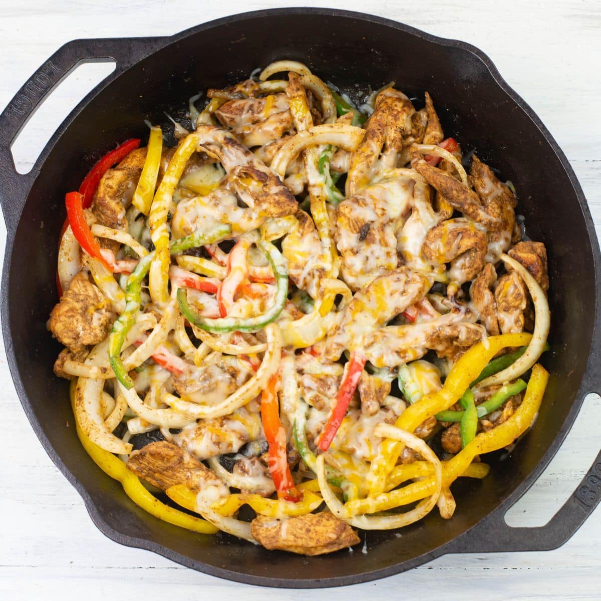 Chicken Fajita filling in a cast iron skillet.