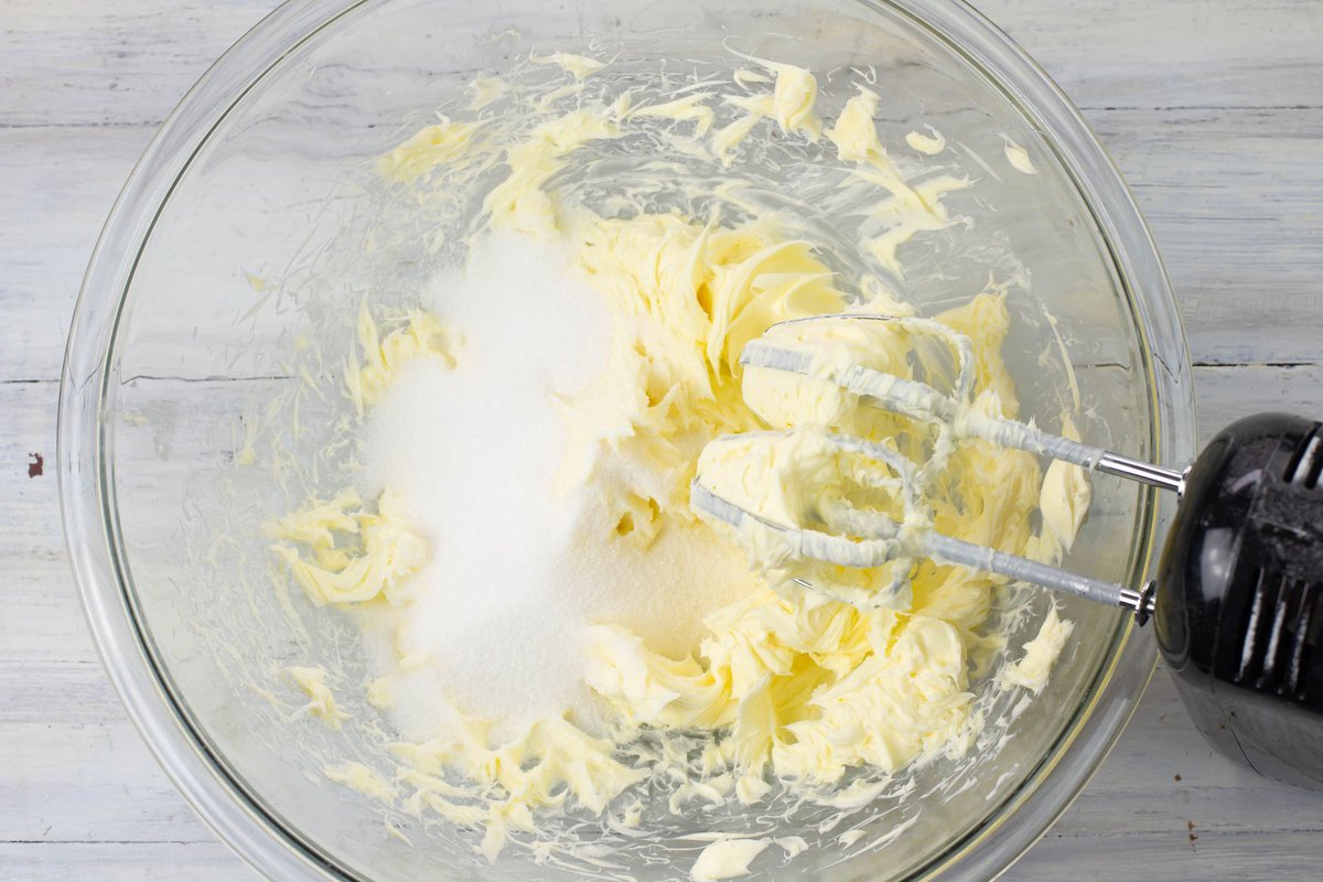 Softend butter and granulated white sugar in a bowl.