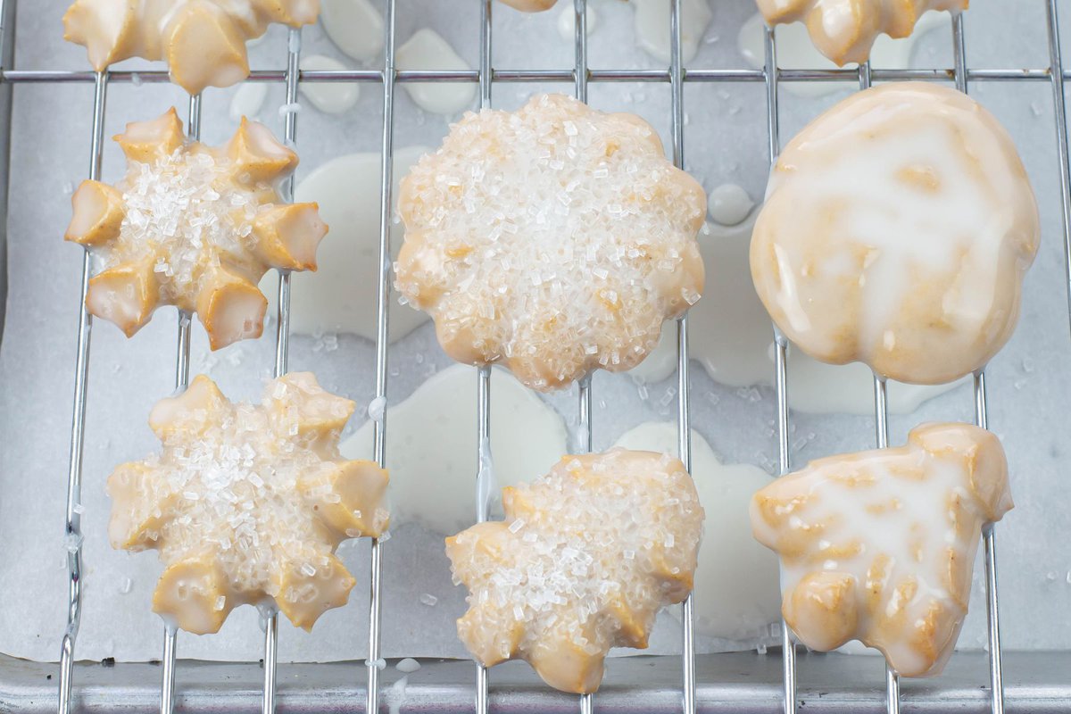 Cookies dipped in a sugar glaze and sprinkled with sparkling sugar.