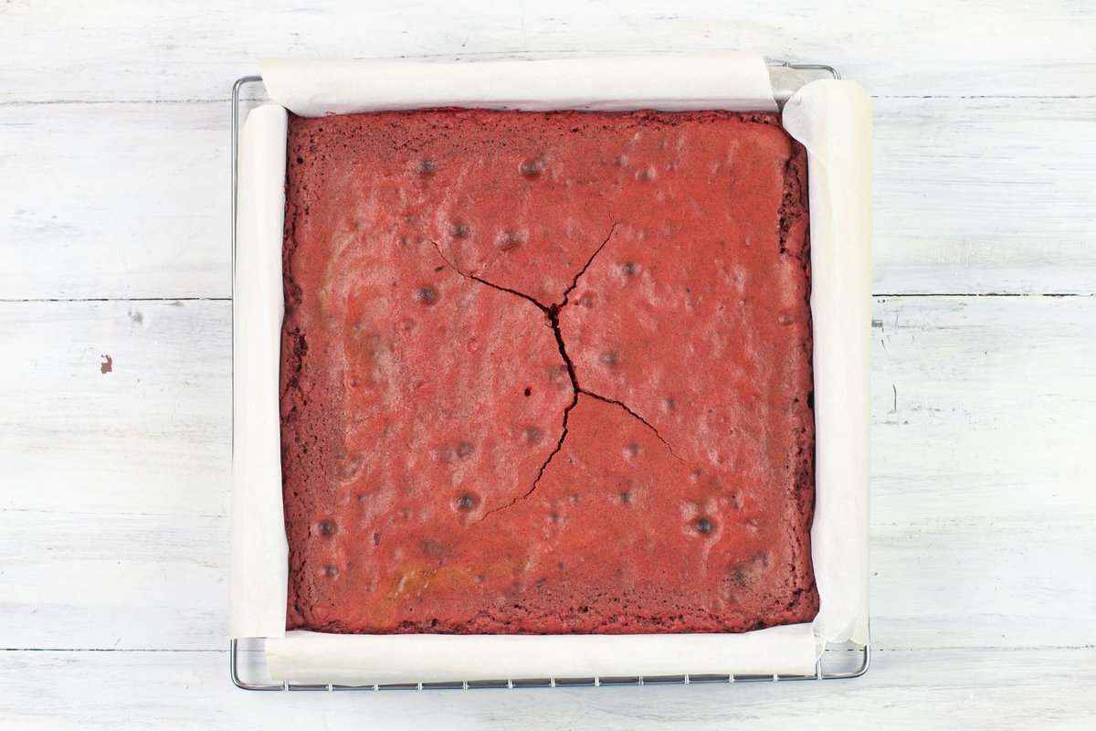 Red Velvet Brownies baked in a 8x8 square pan.