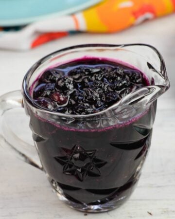 Homemade blueberry sauce in a vintage glass