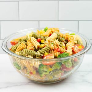 Easy Italian Pasta Salad served in a large glass serving bowl.