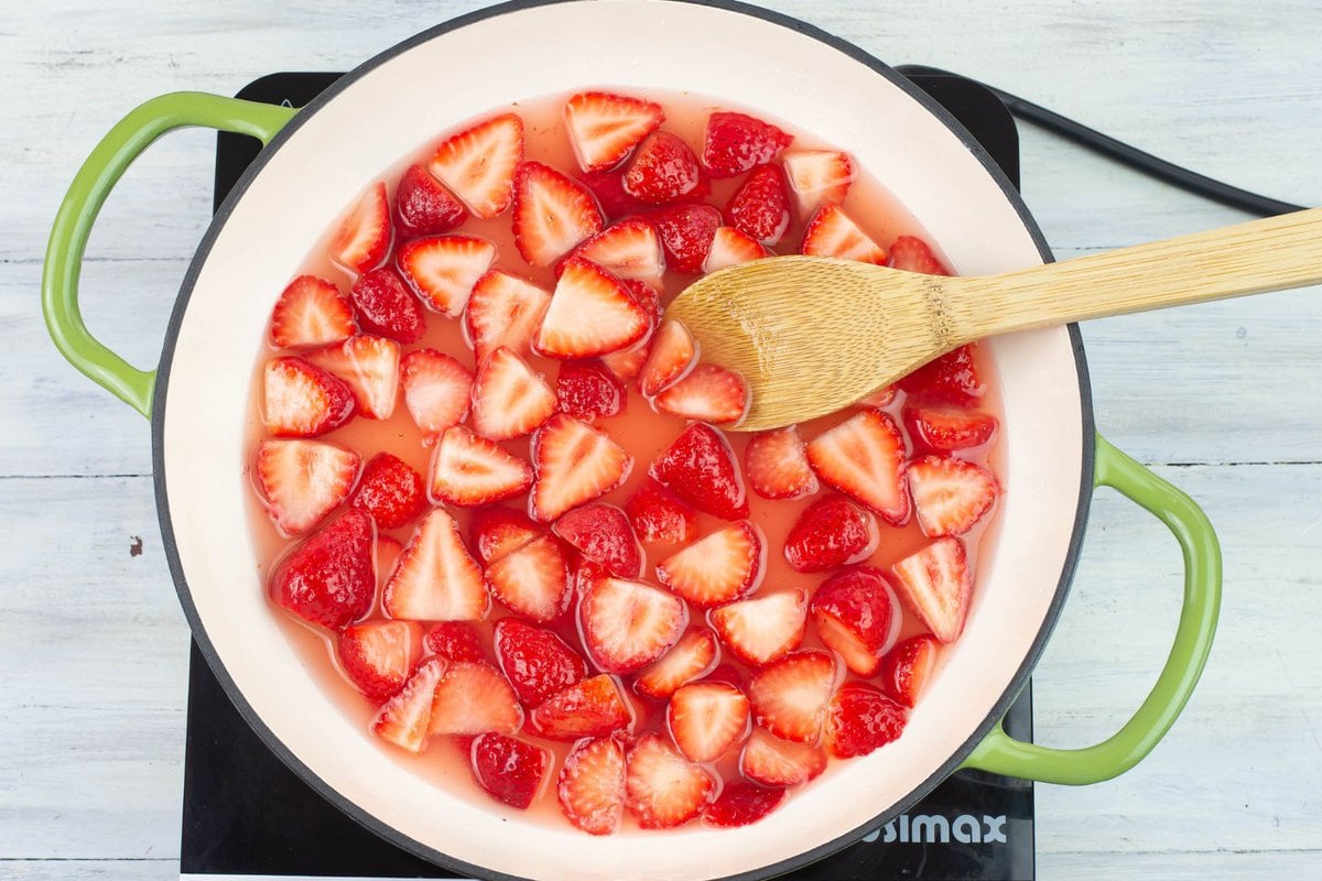 Overhead image showing the strawberries in the melted sugar syrup.